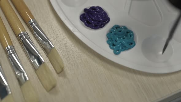 Paints, Brushes and Palette Ready for Drawing alt