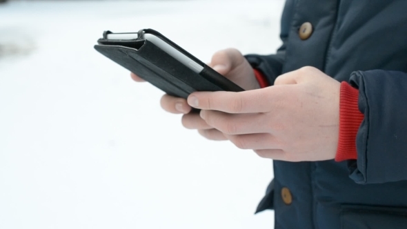 Caucasian Teenager Using Tablet