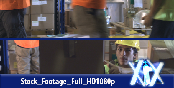 Workers In Warehouse Preparing Goods For Dispatch  alt