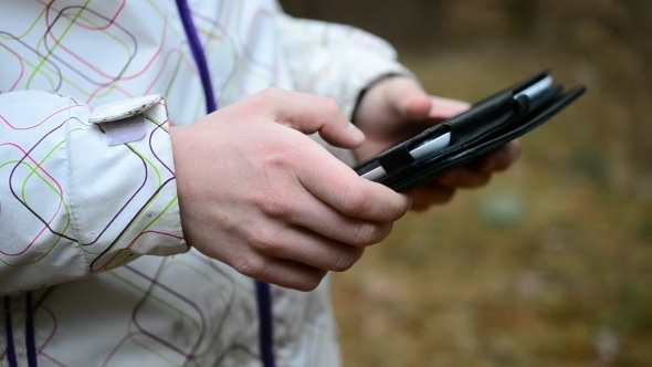 Caucasian Teenager Using Tablet