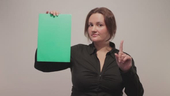 Woman With Green Screen Board Show Prohibition