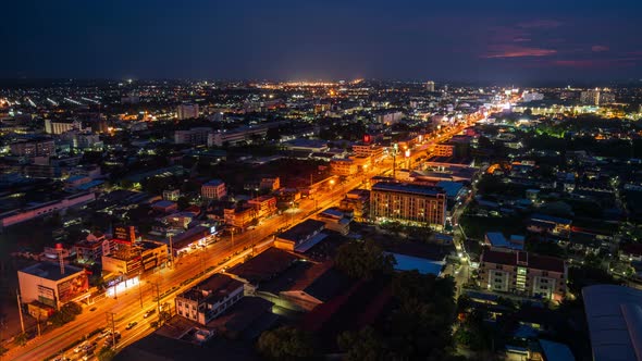 day to night timelapse of Aerial view of Nakhon Ratchasima city or Korat at sunset, Thailand alt