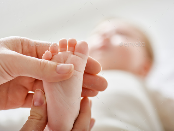 doctor examining a baby - Stock Photo - Images
