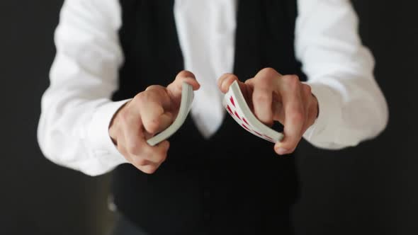 Man Showing Trick With Playing Cards 4 alt
