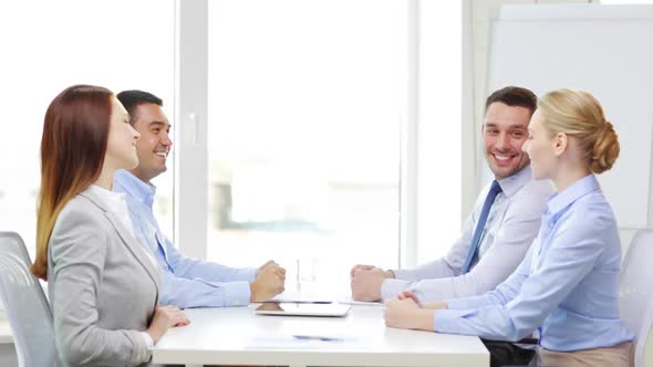 Smiling Team With Table Pc Working In Office 3 alt