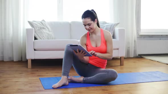 Smiling Teenage Girl With Tablet Pc At Home 1 alt