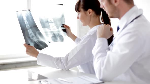 Two Doctors With X-Ray Prints alt