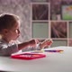 Interested Girl Learns to Count with Sticks at Mental Maths - VideoHive Item for Sale