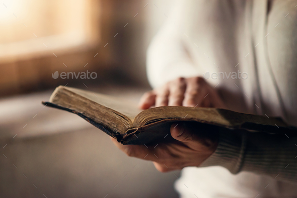 Woman with bible - Stock Photo - Images