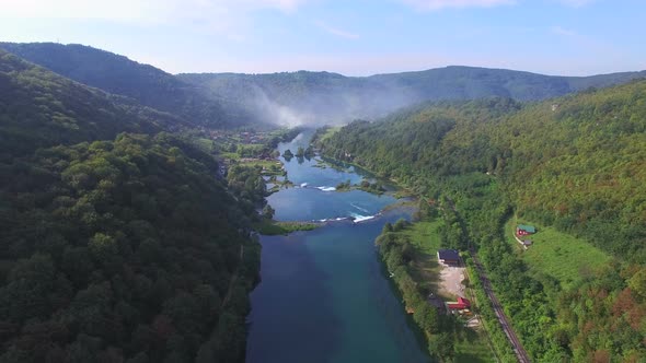 Aerial view of beautiful green canyon and waterfalls of Una river, Bosnia alt