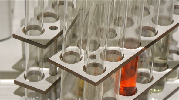 Two Sets of Long Test Tubes on the Holder