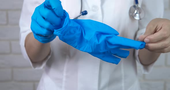 Takes gloves after using.  alt