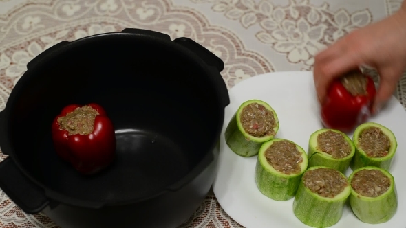 Woman Prepares Stuffed Vegetables In Multicooker 