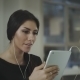 A Woman In The Office Talking With a Tablet - VideoHive Item for Sale