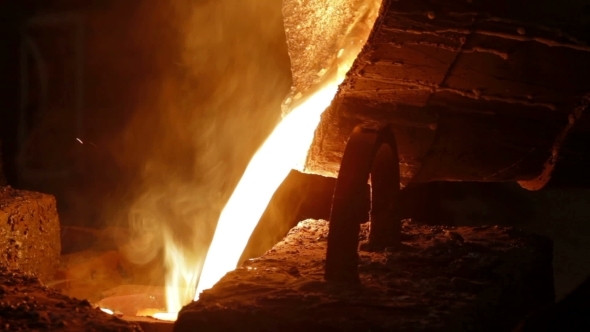 Molten Metal Is Poured Into Mold In Factory