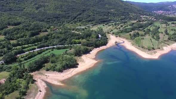 Flying above beautiful landscape of artificial lake of Peruca, Croatia alt