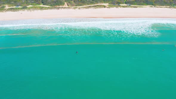 Aerial View of Surfers Waiting Ocean Waves