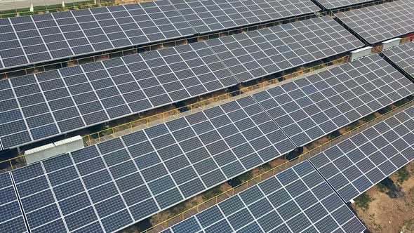 Solar panels in aerial view. Solar farm. Source of ecological renewable energy. alt