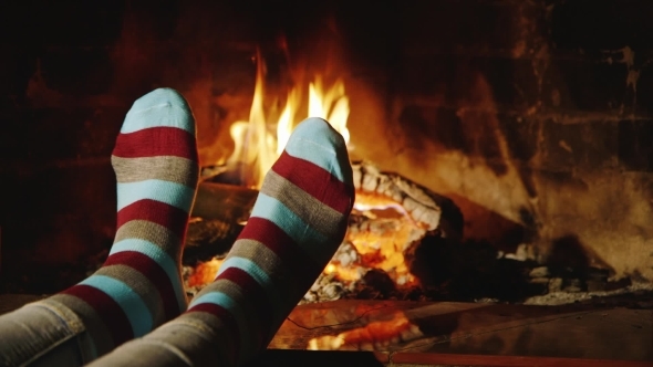 The Girl Warms His Feet By The Fireplace alt