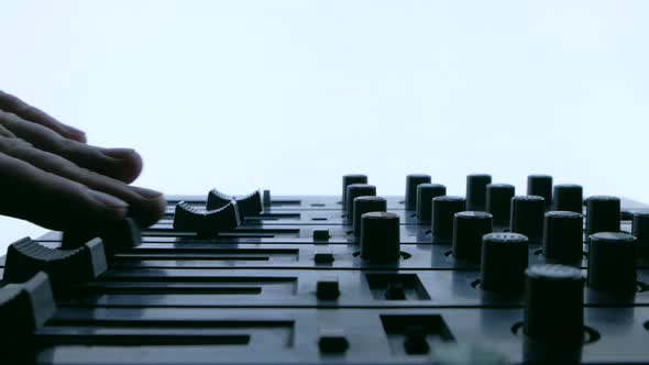 Professional Sound Engineer Balancing Volume of Audio Inputs of Digital Audio alt