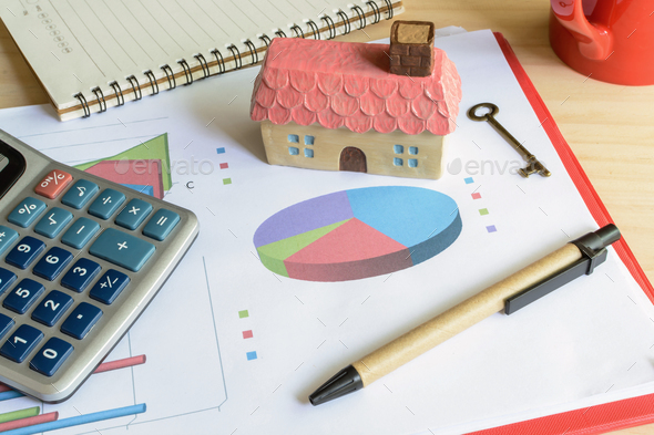 Home finance concept, residential house, expenses calculated - Stock Photo - Images