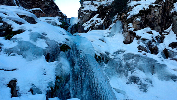 Waterfall in the Winter Mountains