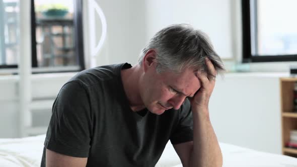 Man experiencing depression alt