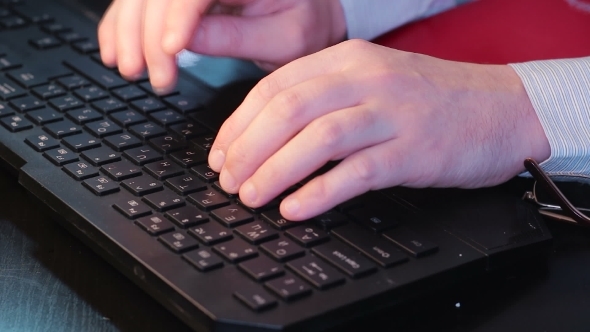 Businessman Typing On Keyboard