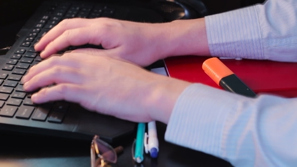 Businesman Typing On Keyboard