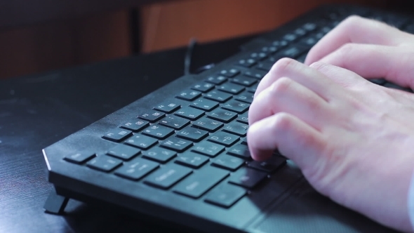 Businesman Typing On Keyboard 