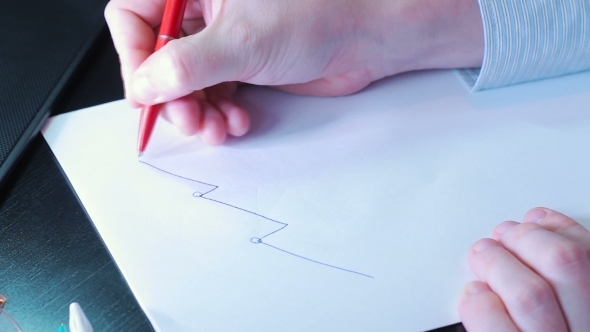 Businessman Male Hands Writing Graphics On Paper