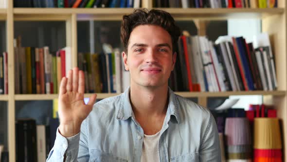 Hello, Young Man Waving Hand alt