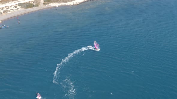 Windsurfers In Blue Ocean alt