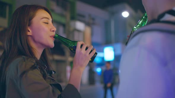 Asian attractive couple drinking alcohol and having party together. alt