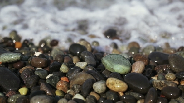 Pebbles And Surf