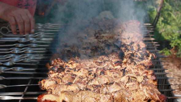 Cooking Kebab From Grilled Pork On Fire