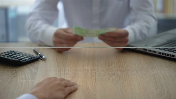 Bank Worker Examining Euro Banknote by Currency Detector, Counterfeit Money alt