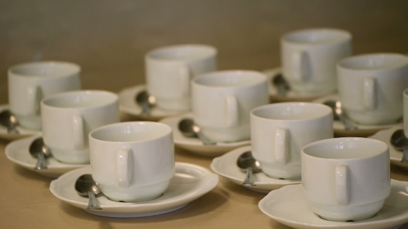 Many White Tea Cups In Table