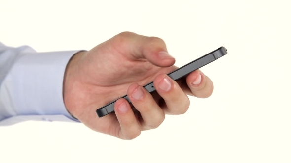 Businessman Holding Mobile Phone In His Hand alt