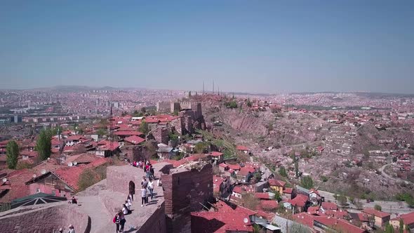 Aerial shot over the old city of Ankara. Historical place and medieval castle walls