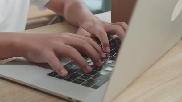 Close Up Of Hand's Man Typing On Computer alt