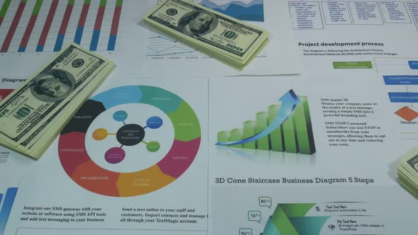 Reports On Sales On The Table In A Modern Office alt