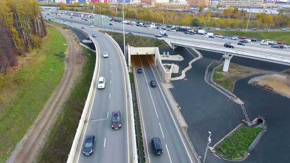 Drone flies over the road urban junction. Highway in Moscow. Bird's eye view