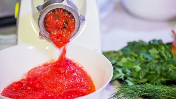 Hasher Mincing Ripe Tomatoes In The Kitchen