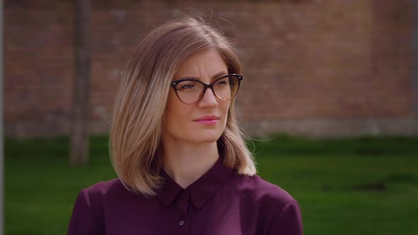 Stressed young Caucasian girl portrait thinking personal problem solution, suffering emotional face. alt