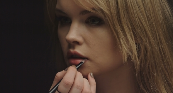 Artist Doing Professional Make Up Of Woman alt