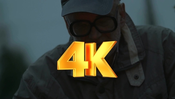 Aged Man Thinking And Keeping An Eye To The Fire alt