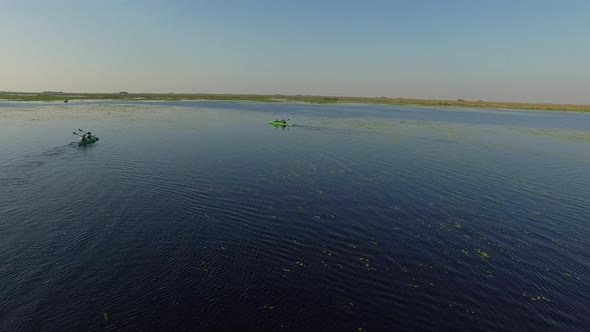 Tourists canoeing in Ibera Wetlands, Corrientes Province, Argentina alt