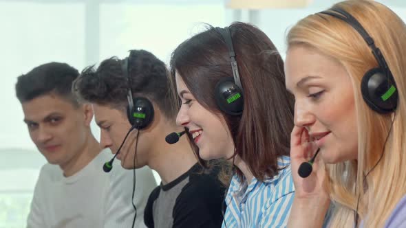 Group of Young People Wearing Headsets, Working at Call Center alt