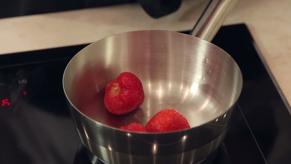 Chef Is Cooking Strawberry Sauce alt